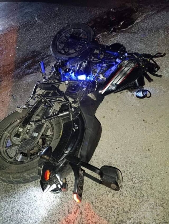 motociclista camión